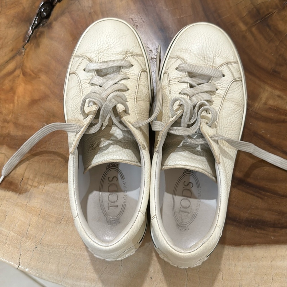 Tods white leather sneakers size 7 1/2 US, size 6.5 in tods. Good condition used